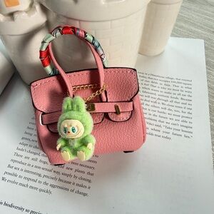 Brown BK AirPods Bag Charm Miniature with Doll